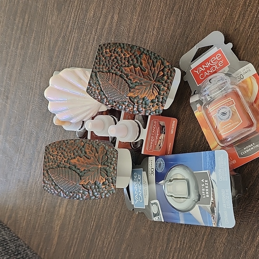 Yankee candle  plug in diffusers, refills, etc...8 pieces all yankee candle